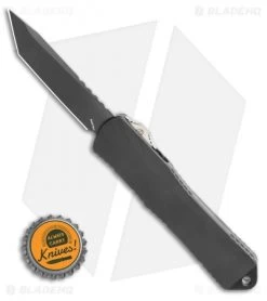 Heretic Knives Manticore-E D/A OTF Knife Black Tanto CF Back Cover (3.125" DLC) -Knife Shop Heretic Knives Manticore E D A OTF Knife Black Tanto CF Back Cover 3.125 DLC BHQ 118698 LS Bottlecap
