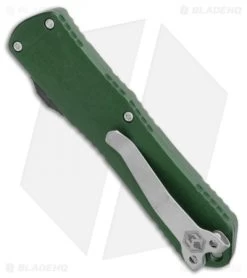 Heretic Knives Manticore-E D/A OTF Knife Green Recurve (3.125" Battleworn) -Knife Shop Heretic Knives Manticore E OTF Green Recurve Battleworn H029 5A GRN BHQ 109484 jr side